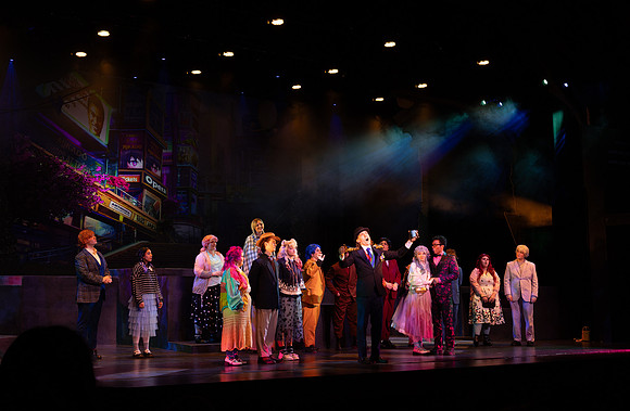 Students performing in the play The Mikado.
