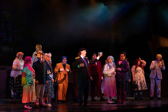 Students performing in the play The Mikado.