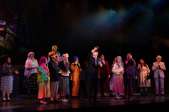 Students performing in the play The Mikado.