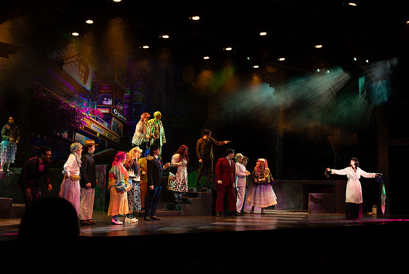 Students performing in the play The Mikado.