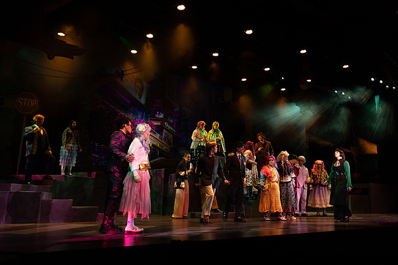 Students performing in the play The Mikado.