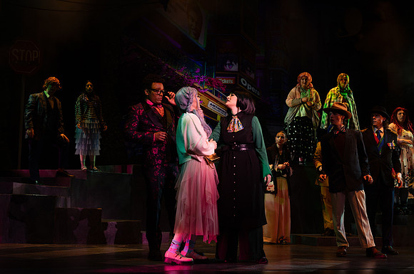 Students performing in the play The Mikado.