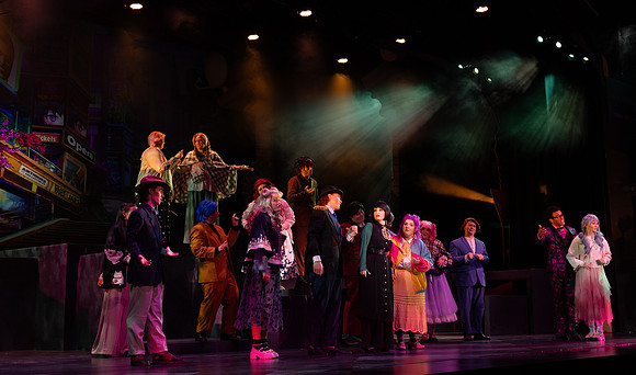 Students performing in the play The Mikado.