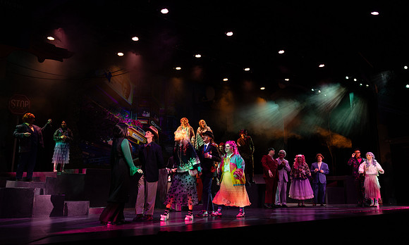 Students performing in the play The Mikado.