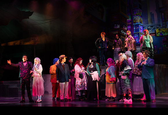 Students performing in the play The Mikado.