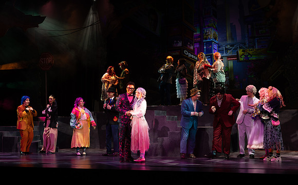 Students performing in the play The Mikado.