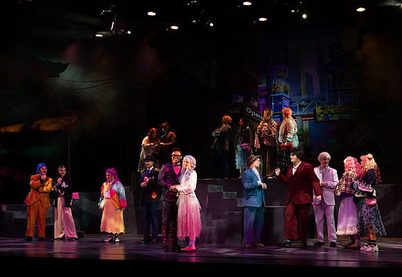 Students performing in the play The Mikado.