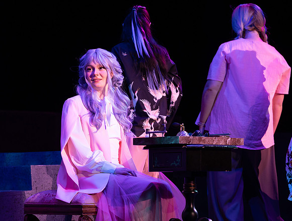 Students performing in the play The Mikado.
