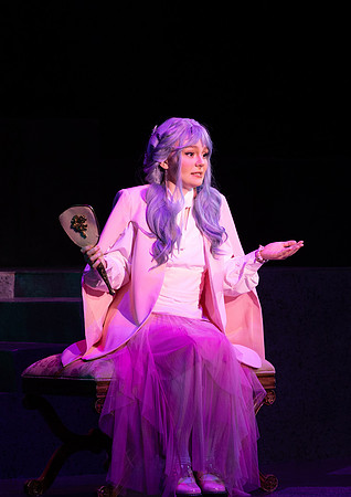Students performing in the play The Mikado.