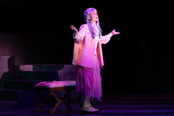 Students performing in the play The Mikado.