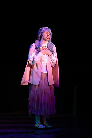 Students performing in the play The Mikado.