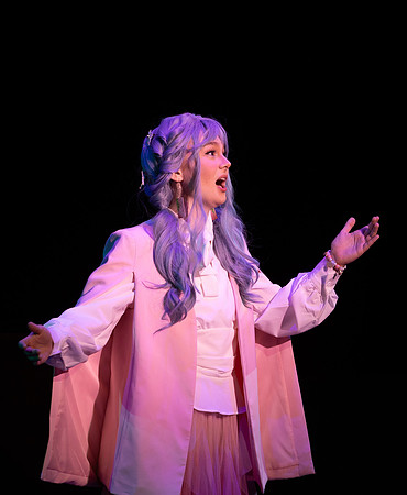 Students performing in the play The Mikado.