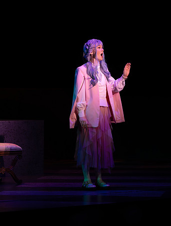 Students performing in the play The Mikado.
