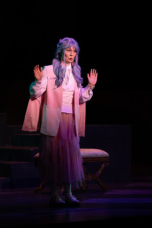 Students performing in the play The Mikado.