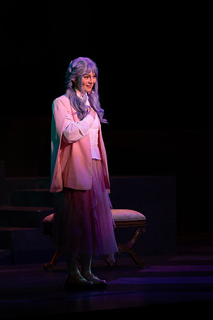 Students performing in the play The Mikado.