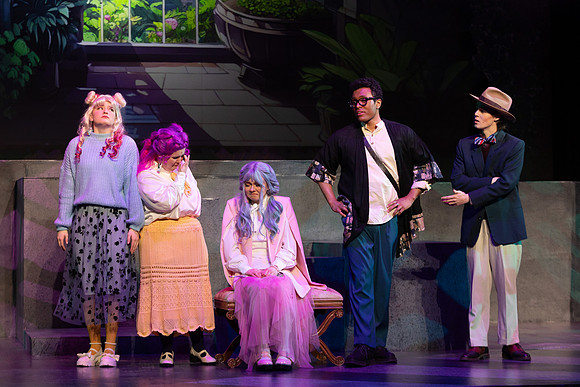 Students performing in the play The Mikado.