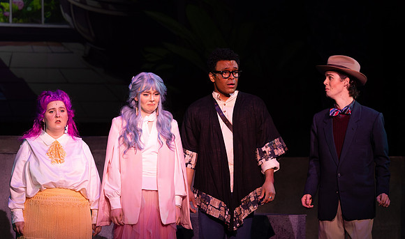Students performing in the play The Mikado.