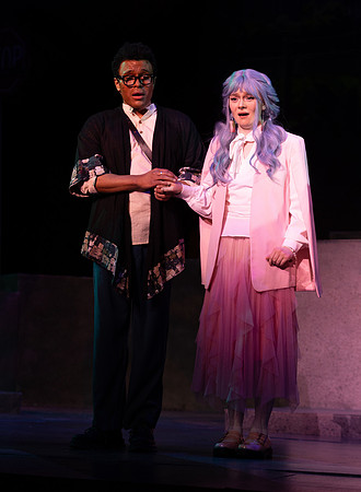 Students performing in the play The Mikado.