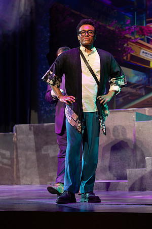 Students performing in the play The Mikado.