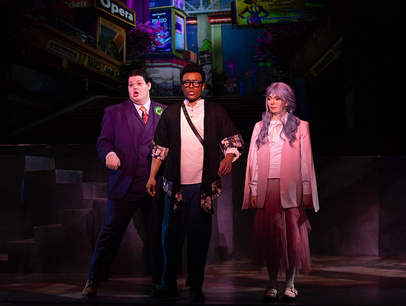 Students performing in the play The Mikado.