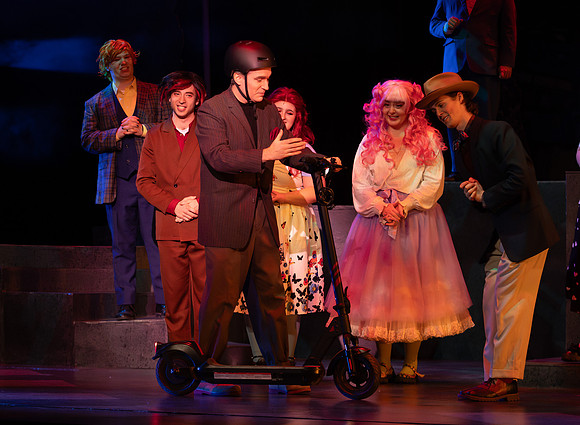 Students performing in the play The Mikado.