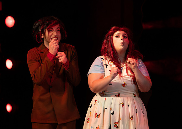 Students performing in the play The Mikado.