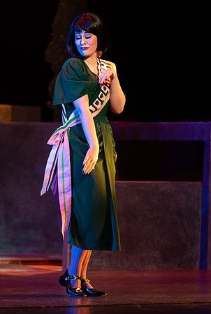 Students performing in the play The Mikado.