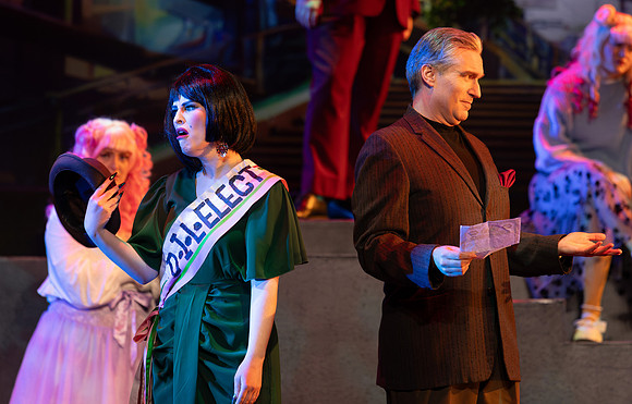 Students performing in the play The Mikado.