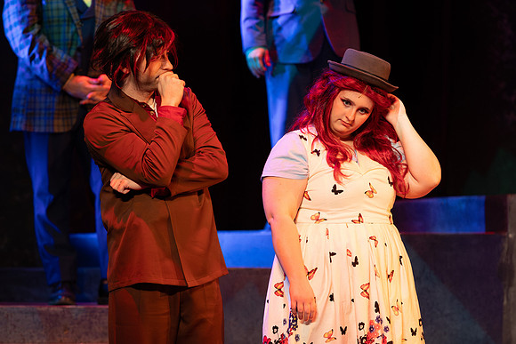 Students performing in the play The Mikado.