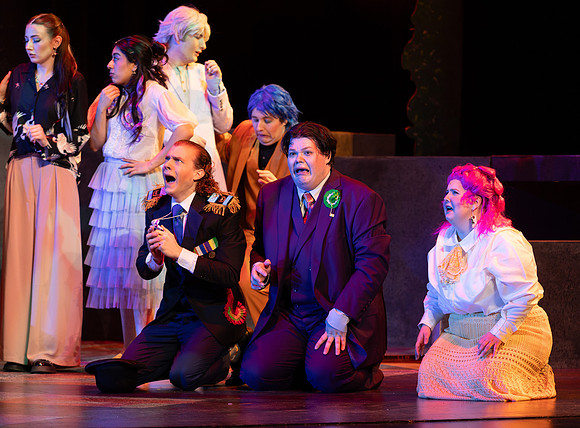 Students performing in the play The Mikado.