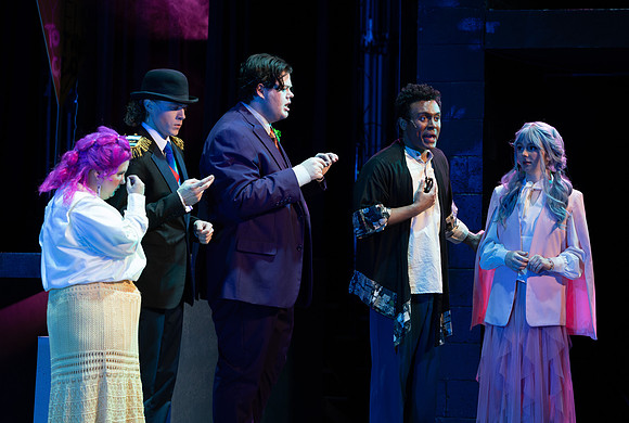 Students performing in the play The Mikado.