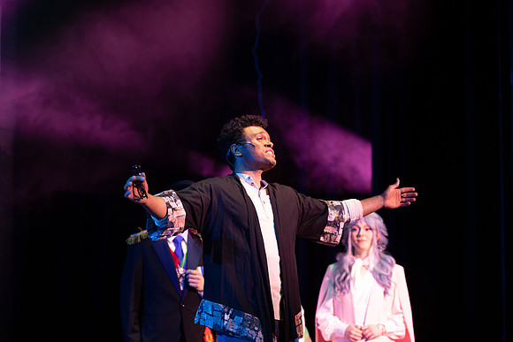 Students performing in the play The Mikado.