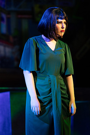 Students performing in the play The Mikado.