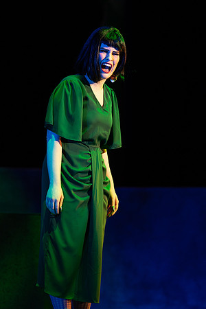 Students performing in the play The Mikado.