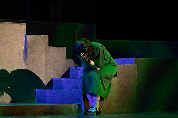 Students performing in the play The Mikado.