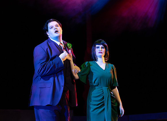 Students performing in the play The Mikado.
