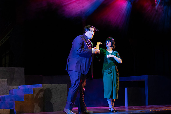 Students performing in the play The Mikado.