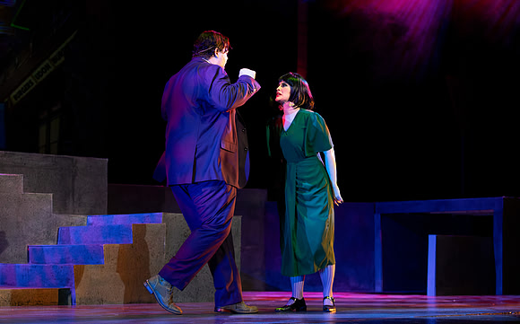 Students performing in the play The Mikado.