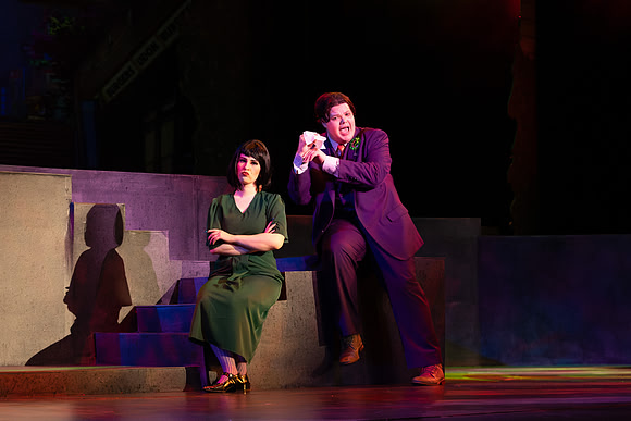 Students performing in the play The Mikado.