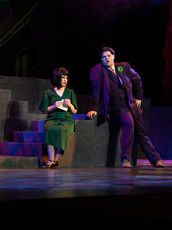 Students performing in the play The Mikado.