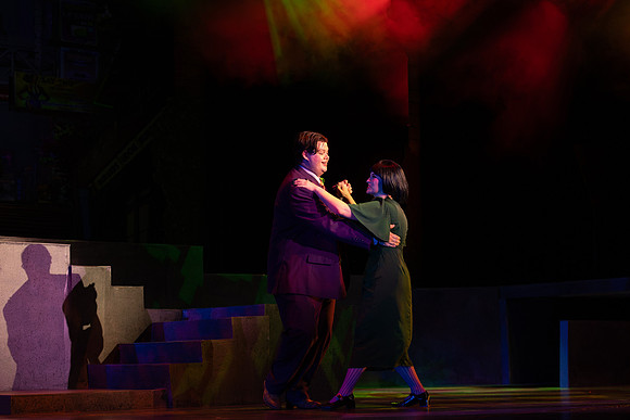 Students performing in the play The Mikado.