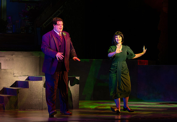 Students performing in the play The Mikado.