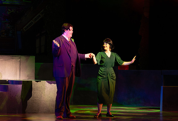 Students performing in the play The Mikado.