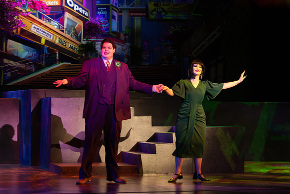 Students performing in the play The Mikado.