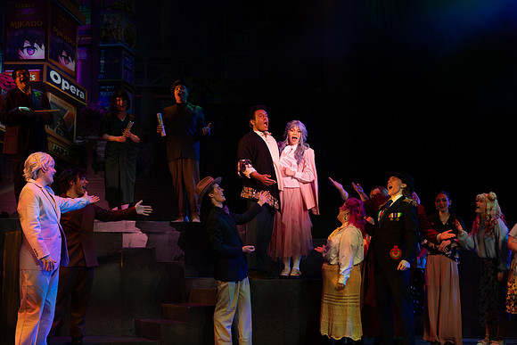 Students performing in the play The Mikado.
