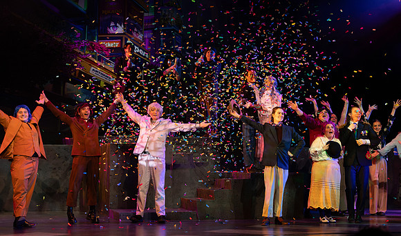 Students performing in the play The Mikado.