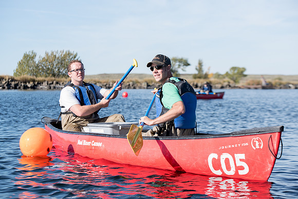 Students in the class of Principle of Fish Management,taught by Brother Billman, learn how to set gill nets to capture fish in the ponds at Sand Creek.