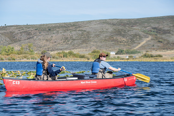Students in the class of Principle of Fish Management,taught by Brother Billman, learn how to set gill nets to capture fish in the ponds at Sand Creek.