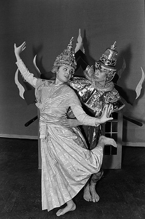 A man and a woman dancing.