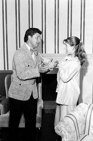 Oscar Bustos and Julina Newsome talking.